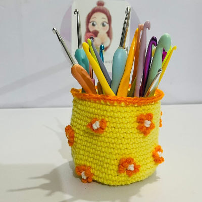 Crochet  Storage Basket with hand embroidery on it