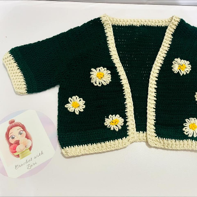 Crochet Girl Crop Top With hand flower embroidery on it